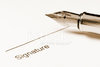 15421336-fountain-pen-ready-for-signature-on-paperwork.jpg